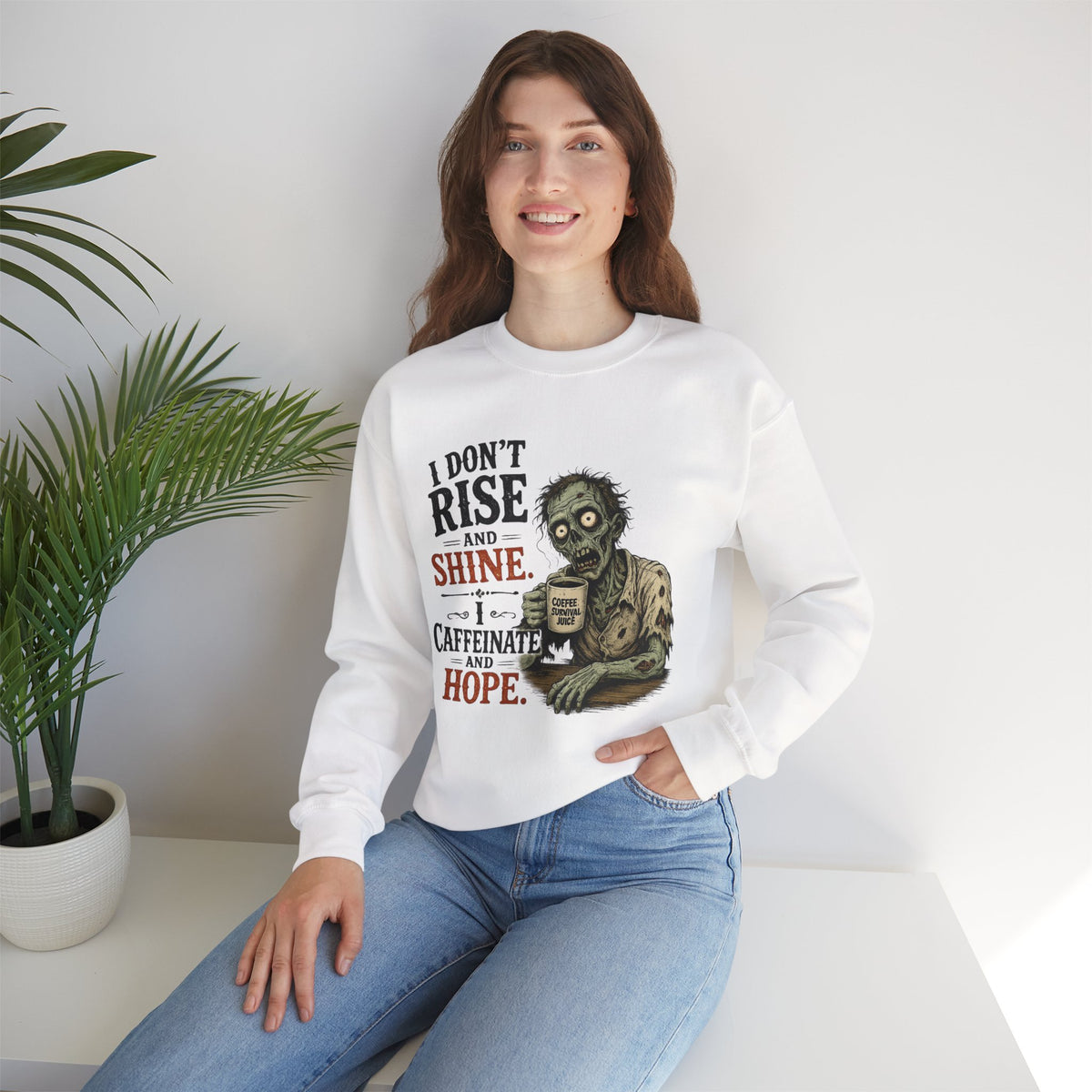 "I Don't Rise and Shine, I Caffeinate and Hope" Zombie Sweatshirt — product photo 1 | The ClawMark Store